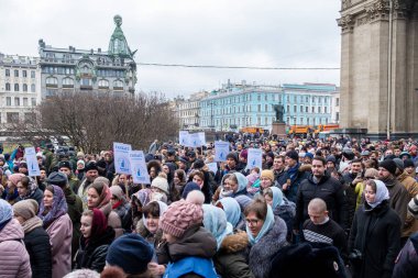 RUSSIA, ST.PETERSBURG - February 16, 2020: Orthodox priests and believers are holding a procession to the Kazan Cathedral. Close up.