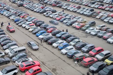 RUSSIA, ST.PETERSBURG - March 5: Full car parking near the mall. Top view.