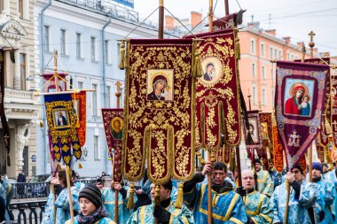 RUSSIA, ST.PETERSBURG - February 16, 2020: Orthodox priests with icons are religious procession. Close up.