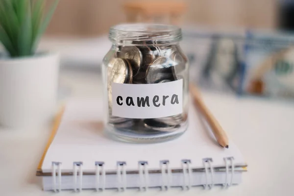 Savings Concept Camera Glass Jar Coins Inscription Close — Stock Photo, Image