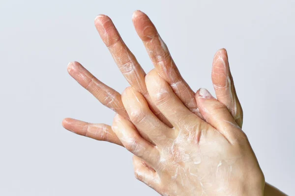Demonstration of washing hands with soap. Close up.