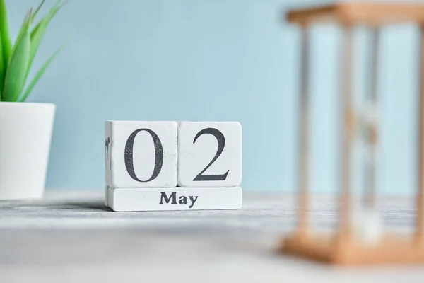02 second May Month Calendar Concept on Wooden Blocks. Close up.