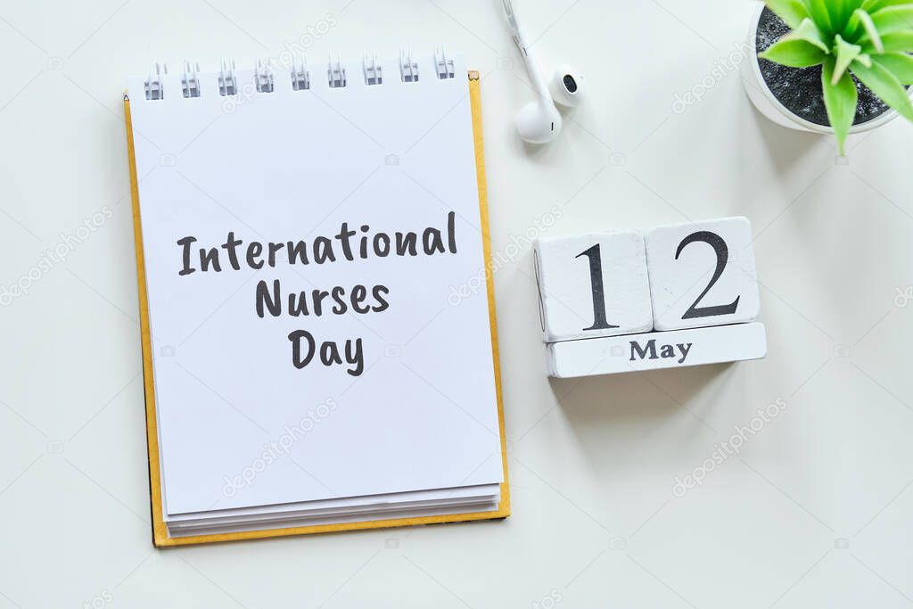 International Nurses Day 12 twelfth May Month Calendar Concept on Wooden Blocks. Close up.