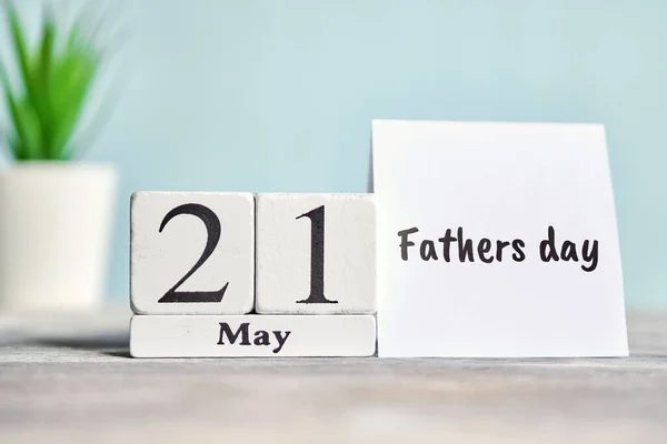 21 twenty first Fathers day May Month Calendar Concept on Wooden Blocks. Close up.