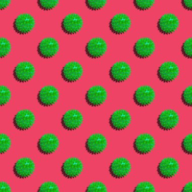 Kırmızı arka planda soyut virüsün kusursuz bir şekli var. Kapat..