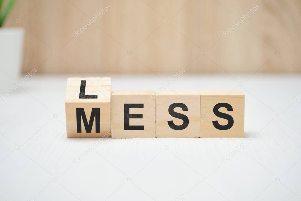 Less mess words on wooden blocks. Close up.