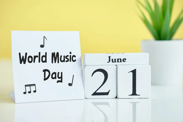 World Music Day 21 twenty first june Month Calendar Concept on Wooden Blocks. Close up.