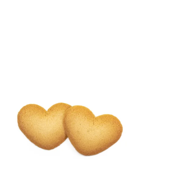 Sevgililer günü için beyaz arka planda aşk kalp şeklinde kurabiyeler..