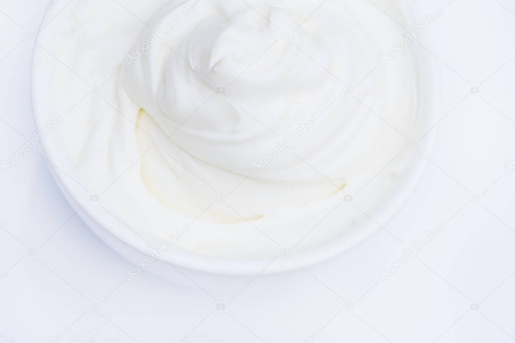 Sour cream in a white bowl