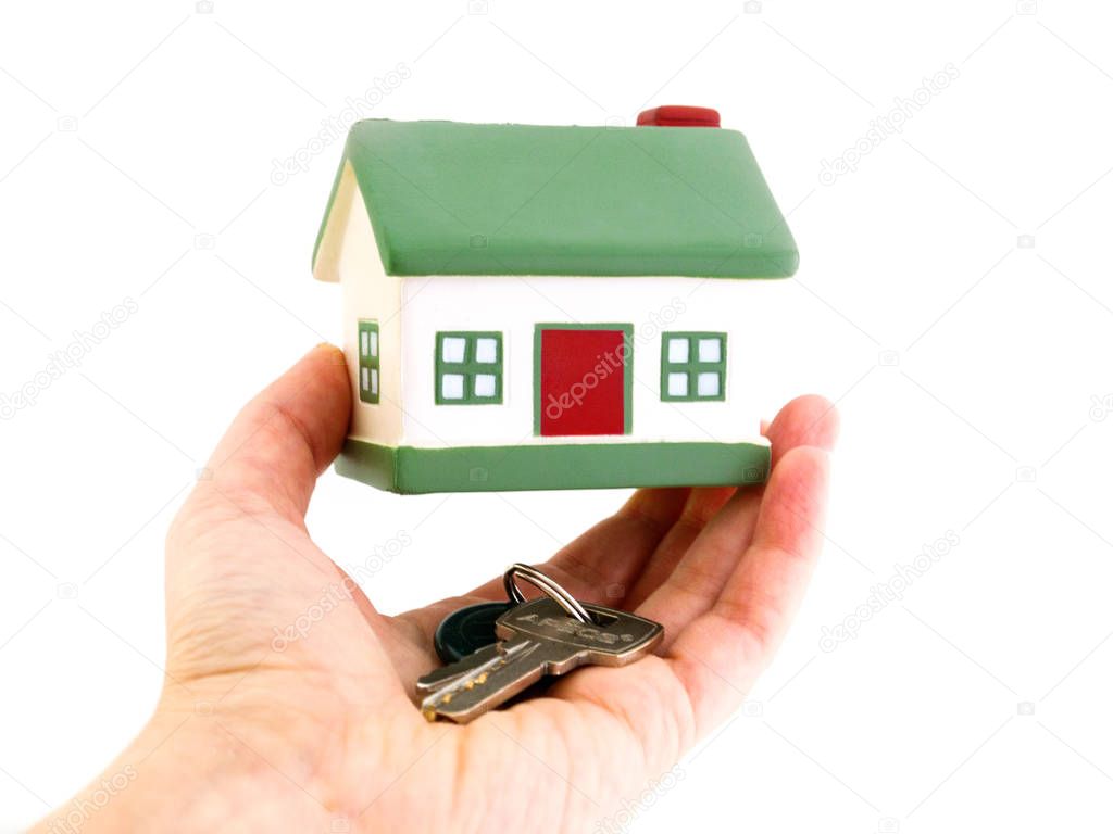 Miniature houses mortgage and real estate investment or property insurance