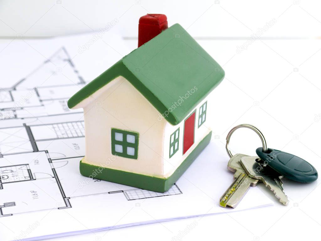 Miniature houses mortgage and real estate investment or property insurance