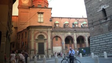 Bologna, Italy-circa 2016: View to the famous Asinelli and Garisenda towers in Bologna, Italy. Built in 11 century Asinelli tower is 97 m. tall and highest in Italy.ultra hd 4k, real time