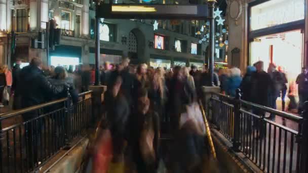 LONDON,UK, DECEMBER, Time lapse view of the Oxford Circus Tube Station entrance at rush hour, on December in London, United Kingdom