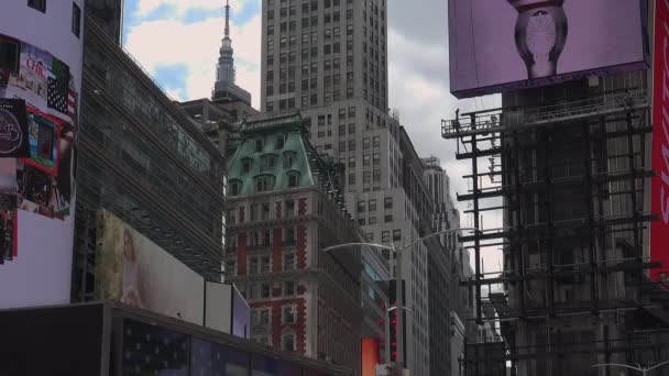 NEW YORK CITY - May: Pedestrians and traffic in Times Square in New York, NY. Times square is one of the world's most popular attractions with nearly 40 million visitors annually. — Stock Video