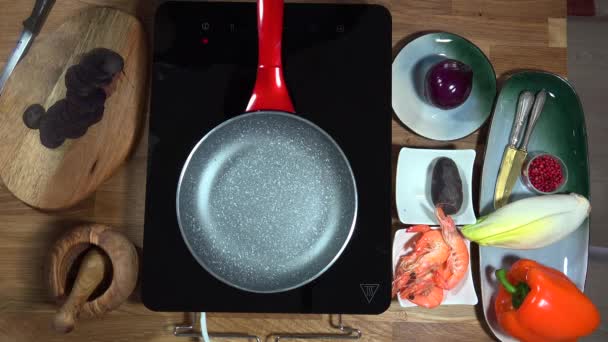 Top View Food Preparation Shrimp Violet Potatoes Pan Stove Induction — Stock Video