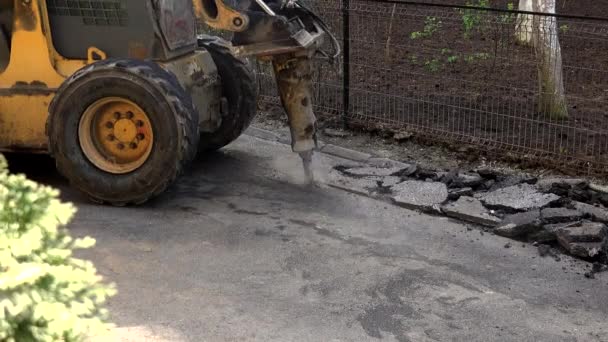 Worker Cutting Asphalt Road Close — Stock Video