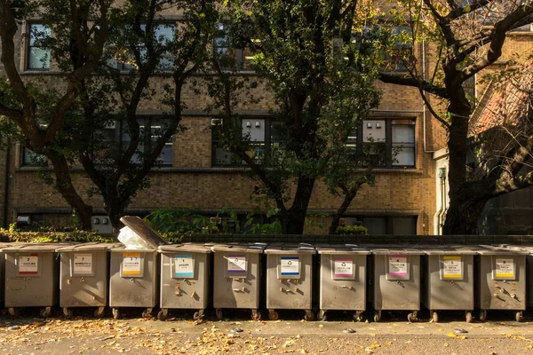 Dec 9, 2016 - Tokyo, Japan: waste sorting bins at Tokyo University. Sorting for each type of wastes, some can be recycled, some are combustible. Royalty Free Stock Images