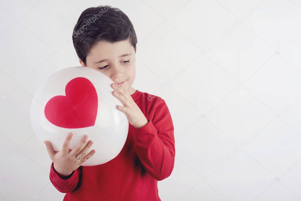  Thoughtful boy with a heart