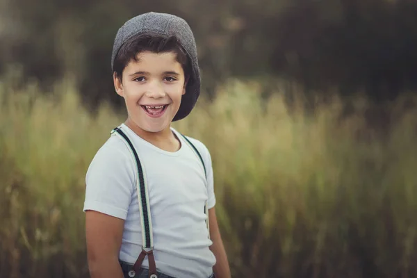 Happy child in the field — Stock Photo, Image