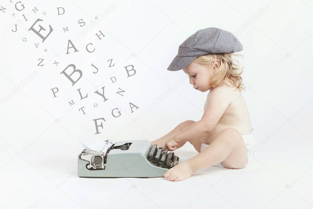 Baby with typewriter  