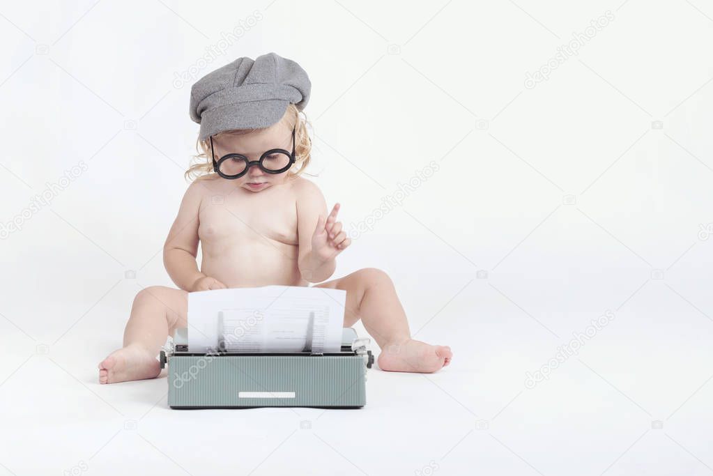 Baby with typewriter  