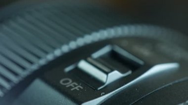 Objektifte dengeleme düğmesi, yakın plan. Güç mercekleri.