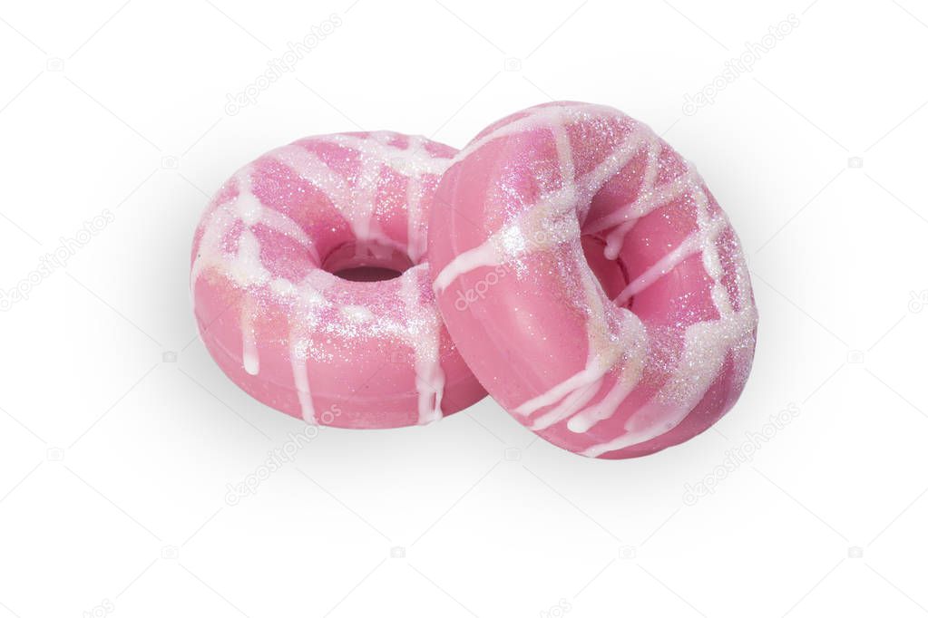 a bomb for a bath, pink donut isolated on white background