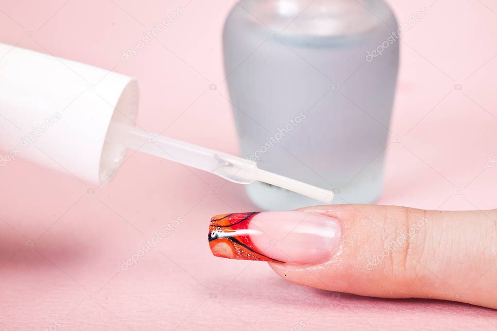 Manicure in beauty salon. SPA procedure, macro shot. Finger close up.