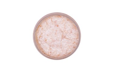 Üzerinde pembe yüz fırçası olan bir kap. Üst görünüm, boşluğu kopyala. Beyaz bir arkaplanda izole edilmiş.