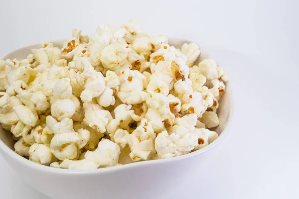 Popcorn in white bowl — Stock Photo, Image