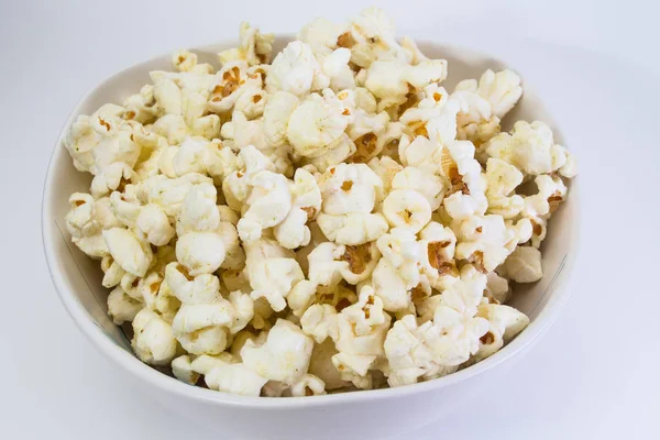 Popcorn in white bowl — Stock Photo, Image