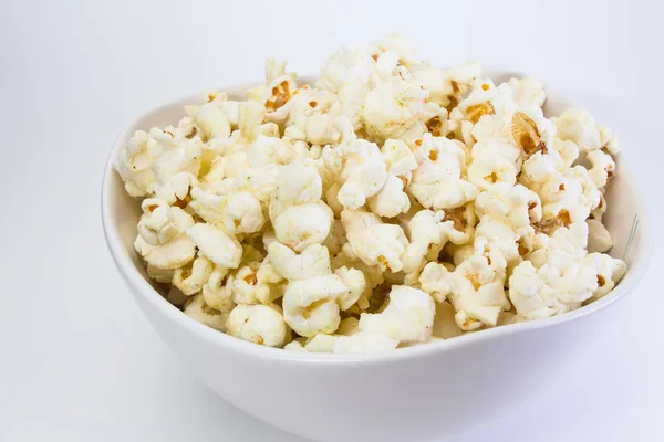 Popcorn in white bowl — Stock Photo, Image