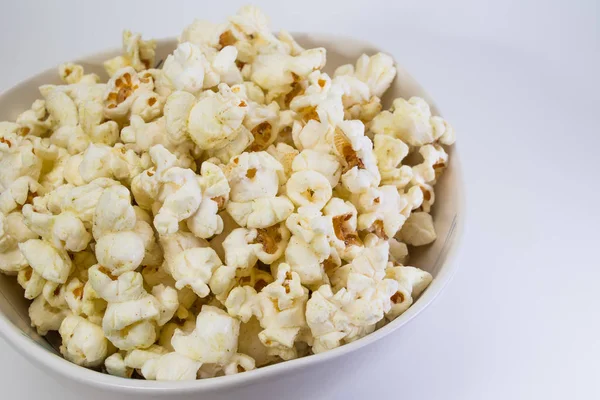 Popcorn in white bowl — Stock Photo, Image