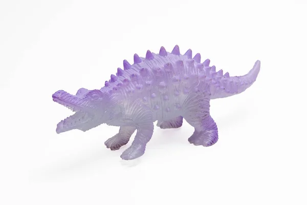 Dinosaur toy plastic figures on white background