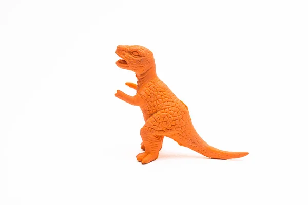 Пластиковые фигурки динозавров на белом фоне — стоковое фото
