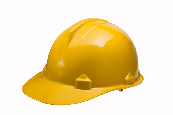 O chapéu de segurança amarelo no fundo branco — Fotografia de Stock