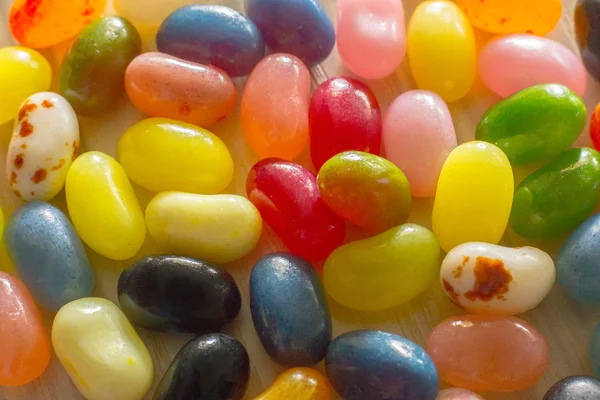 Pile of jelly beans  multi color on wood table — Stock Photo, Image