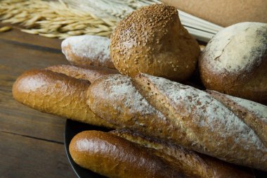 Ekmek buğday yulaf ahşap arka plan görüntü.