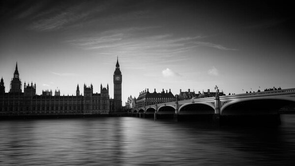 Wide angle long exposure shot of the Westminster Palace and Big Ben in London, England, UK rendered in black and white