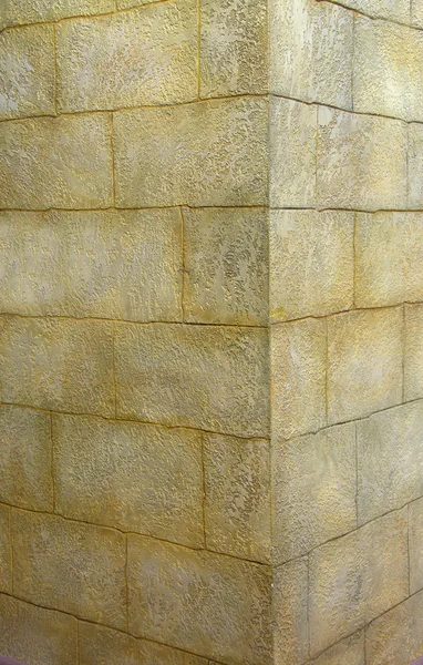 Canto de gesso decorativo de parede com pedra de alvenaria efeito — Fotografia de Stock