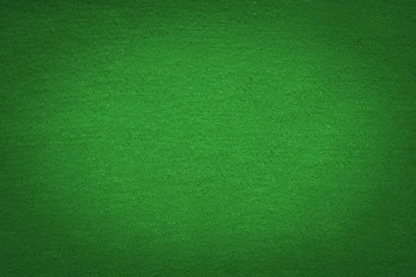 Grön trasa textur med svart gradient vinjett, jul och Stockfoto