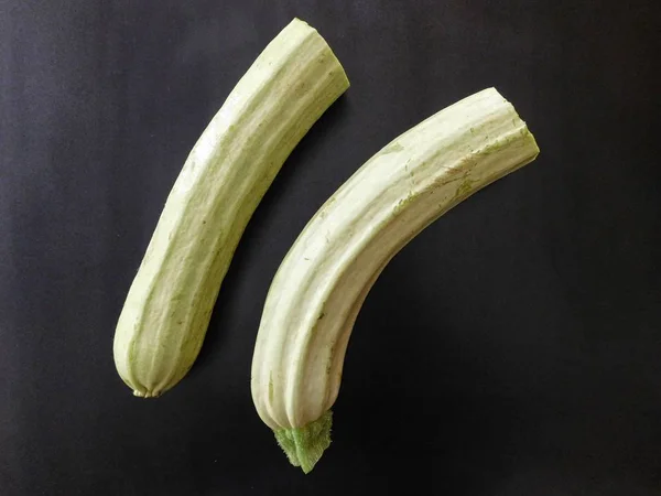 Zucchini on wooden background — Stock Photo, Image