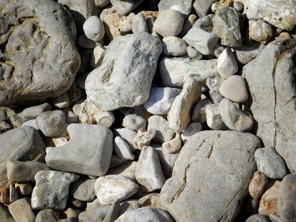 Textura de guijarros en el mar — Foto de Stock