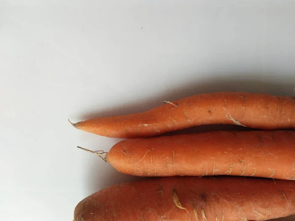 fresh carrots on the white background