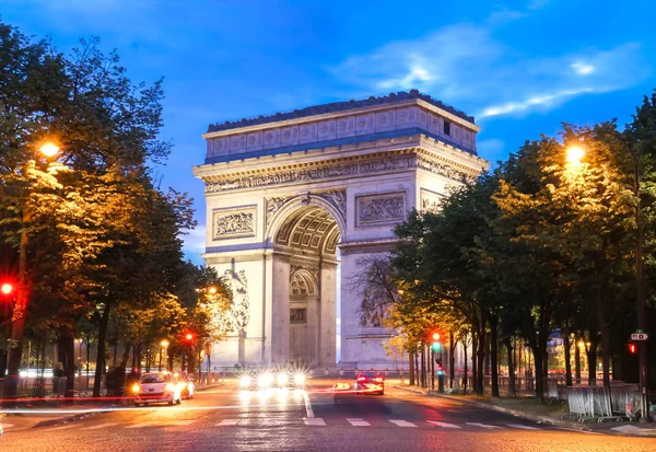 The Arch of Triumph at night, Paris, France