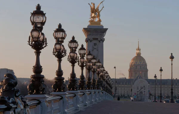 Ornate lamp posts along the Alexandre bridge III br in Paris — Stock Photo, Image