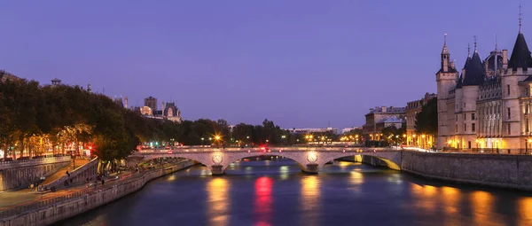 The Pont au Change, bridge over river Seine and the Conciergerie, a former royal palace and prison in Paris, France