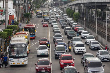 Manila, Philippines - January, 20, 2020: Heavy traffic, many cars on Edsa road in rush hour clipart