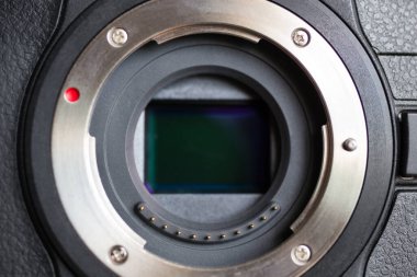 Dijital kamera sensörünün arka planını kapat. Profesyonel fotoğrafçılık teknolojisi kavramı