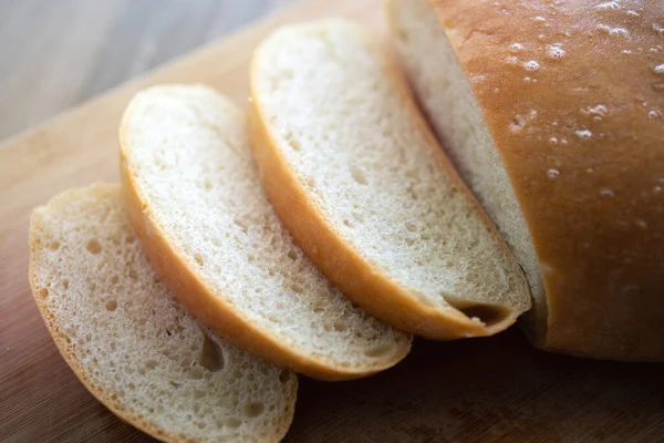 Close Achtergrond Van Gesneden Zelfgemaakte Ronde Brood — Stockfoto